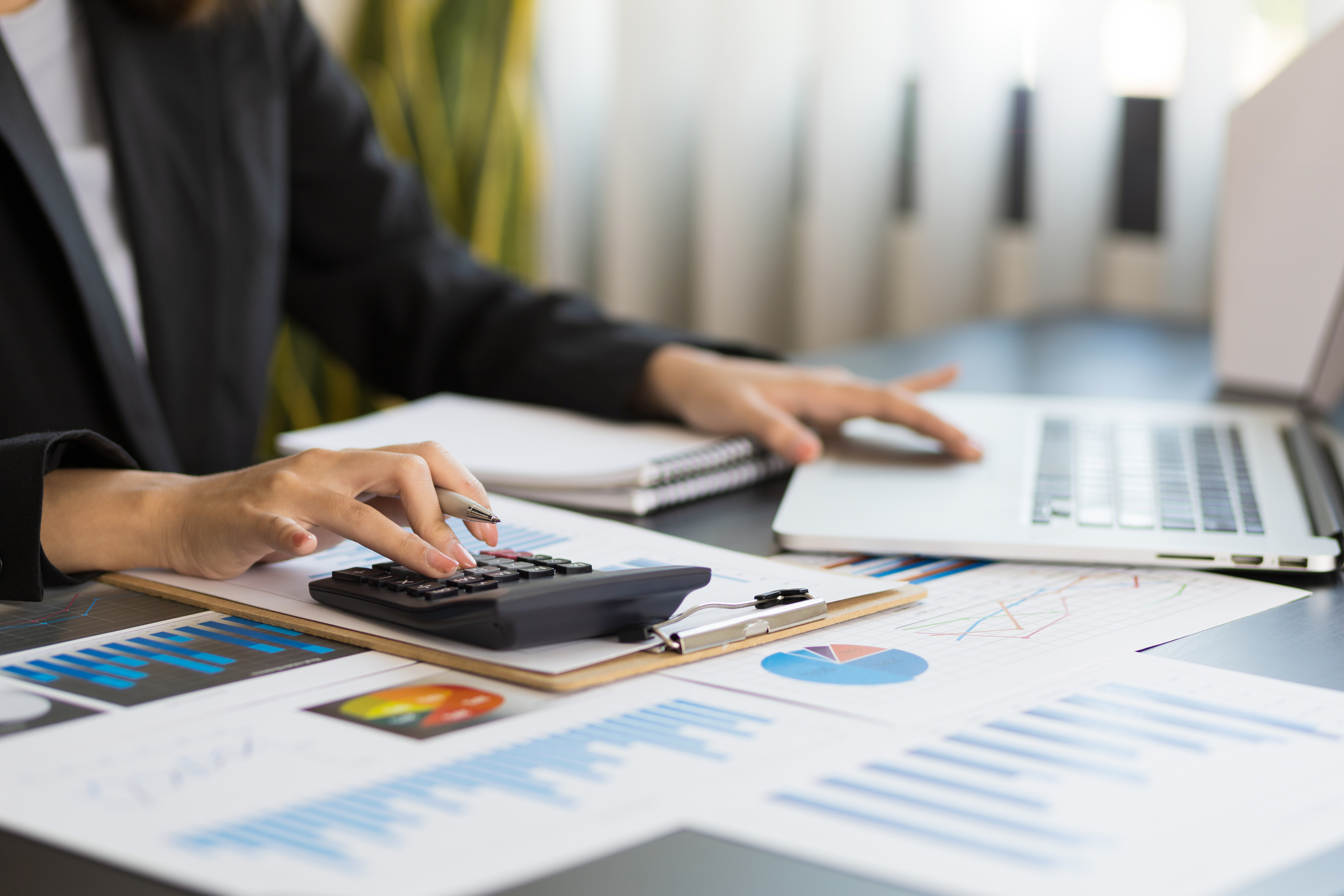 Accounting professional calculating finances